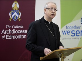 Archbishop Richard Smith discusses proposals to legalize physician-assisted death during a press conference at the Catholic Archdiocese of Edmonton on Feb. 11, 2016.