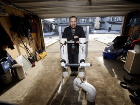 Peter Christou poses with his Swirltex Membrane water filtration system, in Edmonton on Wednesday, Feb. 17, 2016. Christou developed the membrane in his Edmonton garage, and recently set up the membrane at the Concordia Station in Antarctica.