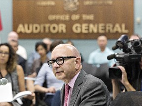 Alberta auditor general Merwan Saher discusses his report on travel expenses and government aircraft involving former premier Alison Redford in Edmonton, Alberta on Thursday Aug 7, 2014.
