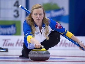 Alberta skip Chelsea Carey makes a shot during the 11th draw against Quebec at the Scotties Tournament of Hearts in Grande Prairie, Alta. Wednesday, Feb. 24, 2016. THE CANADIAN PRESS/Jonathan Hayward
