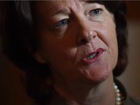 Former Alberta Premier Alison Redford speaks to reporters following a speech, in Ottawa, on September 23, 2015. The image of former premier Alison Redford is expected to be immortalized on the walls of the Alberta legislature this spring - and Redford will be on hand for the unveiling.