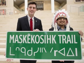 Edmonton Mayor Don Iveson and Enoch Cree Nation Chief Billy Morin pose Friday at City Hall during the announcement of the renaming of 23 Avenue between 215 Street and Anthony Henday Drive to Maskekosihk Trail.