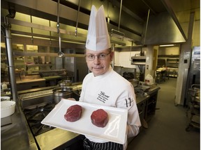 Chef Serge Jost from the Fairmont Hotel Macdonald shows how little difference there is between an eight ounce beef tenderloin (left) and a seven ounce piece (right), on February 9, 2016. The smaller cut can save the restaurant $1.60 per steak.