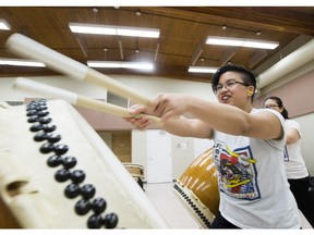 Clarissa Atienza practises with the Kita no Taiko Japanese Drummers during a rehearsal for a 30th anniversary show.