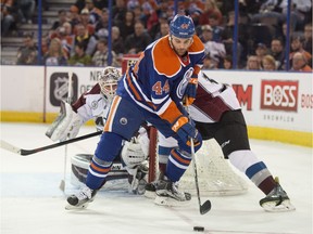 EDMONTON, AB. FEBRUARY 20, 2016 - Zack Kassian    of the Edmonton Oilers, tries to make a play in front of goal Calvin Pickard  of the Colorado Avalanche at Rexall Place in Edmonton.  Shaughn Butts / POSTMEDIA NEWS NETWORK