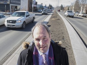 Councillor Ben Henderson on 82 Avenue near 95 Street where there aren't any roadsigns with the speed limit.