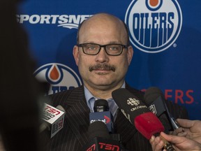 EDMONTON, AB. FEBRUARY 29, 2016 -  General Manager Peter Chiarelli of the Edmonton Oilers speaks to media on the NHL Trade deadline day at the Executive Flight Centre in Leduc County.  Shaughn Butts / POSTMEDIA NEWS NETWORK