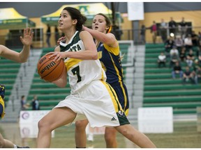 University of Alberta Pandas Maddie Rogers drives to the hoop against Trinity Western University Spartans at the Saville Community Sports Centre Friday.