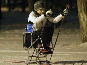 Para-nordic sit-skier Ana Lucas-Osma skis at Gold Bar Park.