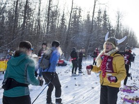 Volunteers dressed as Vikings hand out snacks and warm drinks at one of the many pit stops available for racers during last year's Canadian Birkebeiner.