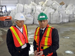 Rajan Ahluwalia (right), former CEO of Greys Paper Recycling, tours then-mayor Stephen Mandel in 2013. File photo.
