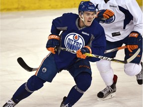 Edmonton Oilers' Connor McDavid practises with teammates on Feb. 1, 2016, as he gets set to return for his first NHL game after breaking his collar bone.