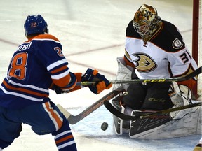 Edmonton Oilers Lauri Korpikoski (28) can't get the puck pass Anaheim Ducks goalie Frederik Andersen (31) during NHL action at Rexall Place in Edmonton, February 16, 2016.