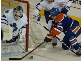 Matt Hendricks attacks the net as the Edmonton Oilers played the Toronto Maple Leafs at Rexall Place last March.