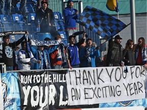 Fans thank FC Edmonton players during the final game of the season against Jacksonville Armada with a 1 - 1 draw in NASL action at Clarke Stadium in Edmonton, Oct. 25, 2015.