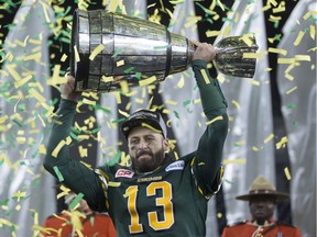 Edmonton Eskimos quarterback Mike Reilly hoisted the Grey Cup after his team's win over the Ottawa Redblacks in the 103rd Grey Cup in Winnipeg last November.