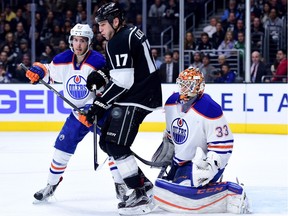 Milan Lucic #17 of the Los Angeles Kings screens Cam Talbot #33 of the Edmonton Oilers on a shot as Jordan Oesterle #82 defends during the second period at Staples Center on February 25, 2016 in Los Angeles, California.