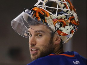 Edmonton Oilers goalie Cam Talbot takes a break during the second period against the New York Islanders at Brooklyn's Barclays Center on Feb. 7, 2016.