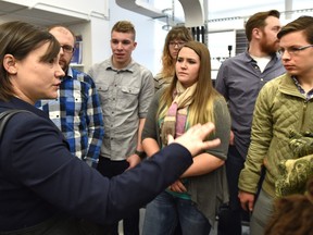 Shannon Phillips, Alberta minister of environment and parks, talks to NAIT students after announcing funding for solar energy projects.