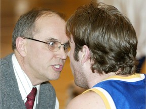 In this 2003 photo, Concordia men's basketball coach Phil Allen goes nose-to-nose with son and player Joel. The newspaper caption at the time quoted Joel as saying, "it comes out of respect, respect both ways."