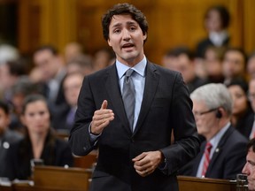 Prime Minister Justin Trudeau responds during question period in the House of Commons in Ottawa on Tuesday, Feb. 2, 2016. Trudeau will meet with Alberta Premier Rachel Notley on Wednesday.