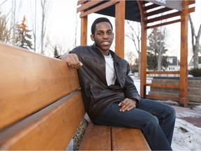 Emmanual Nnamani, 17, poses for a photo near his Westmount home in Edmonton, Alta., on Sunday, February 21, 2016. He received a $5,000 scholarship through the Horatio Alger Association to pursue an education in science. Photo by Ian Kucerak