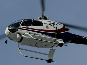 The public checks out the Edmonton Police Service helicopter, Air-1. Police want to replace it with a new helicopter.