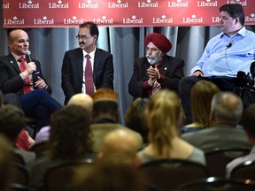 From left, Liberal MPs Randy Boissonnault, Amarjeet Sohi, Minister of Infrastructure and Communities, Darshan Kang and Kent Hehr at the Liberal Party of Canada 2016 Policy Convention in Edmonton, February 27, 2016.