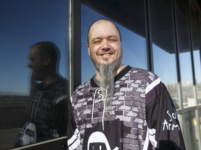 Archbishop Jordan Catholic High School English teacher Mike Joly poses for a photo outside of the 90th Annual Greater Edmonton Teachers' Convention at the Shaw Conference Centre in Edmonton on Feb. 26, 2016. One of Joly's former students writes in Thursday's letters to the editor that the teacher's approach helps students create their own path to success.