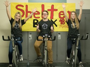 Leadership students heading the Strathcona High School bike-a-thon to top the $1-million mark raised for charities over eight years are (l to r): Karly Lowe, Sean Janke and Emily McGoey.