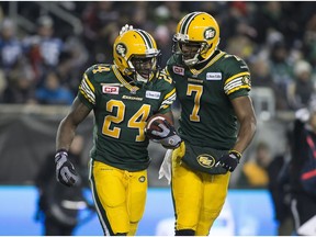 Kenny Stafford, right, celebrates a touchdown with teammate Akeem Shavers during the Grey Cup game in Winnipeg last November. Stafford signed with the Montreal Alouettes on Tuesday.