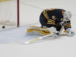 Buffalo Sabres goaltender Robin Lehner reacts after giving up the game-winning goal to Minnesota Wild Jason Pominville during a shootout of an NHL hockey game, Saturday, March 5, 2016, in Buffalo, N.Y.  Minnesota won 3-2 in a shootout. (AP Photo/Gary Wiepert) ORG XMIT: NYGW106