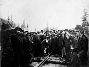 Lord Strathcona drives home the last spike to complete the Canadian Pacific Railway on Nov. 7, 1885 in Eagle Pass, B.C.