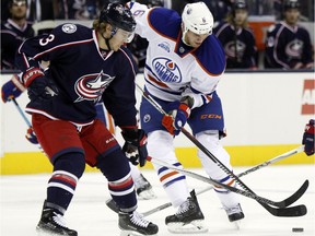 Edmonton Oilers defenceman Adam Pardy, seen here going up against Cam Atkinson of Columbus on Friday,  will play against his former Jets teammates in Winnipeg on Sunday, March 6, 2016.