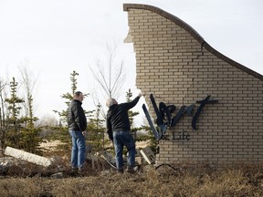 A woman was airlifted to hospital after crashing her car into a Welcome to St. Albert sign Thursday morning.