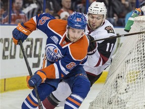 Jordan Oesterle of the Edmonton Oilers, skates away from Martin Hanzal of the Arizona Coyotes at Rexall Place in Edmonton on March 12, 2016.