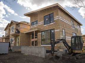 Infill houses under construction.