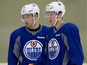 EDMONTON, AB.--Taylor Hall and Connor McDavid of the Edmonton  Oilers practice at the  Leduc Recreation Centre on Monday before boarding a plane to fly to Minnesota on October 26, 2015. (Greg Southam-Edmonton Journal)