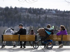 Families enjoy the warm weather, and river valley view, on March 27, 2016. A letter writer suggests Edmonton city council look for more ways to encourage restaurants or cafes with river valley vantage points.