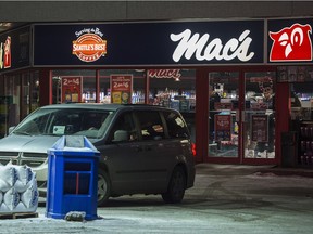 The scene outside a Mac's store where the clerk was murdered Dec. 18, 2015i.