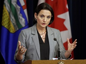 Danielle Larivee, acting minister of Service Alberta, says the province is moving from paper to electronic reminders for vehicle registration and licence renewals to cut costs.