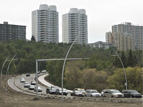 A reader worries about a homeless person curled up on the sidewalk beside Walterdale Hill during last week's rush hour.