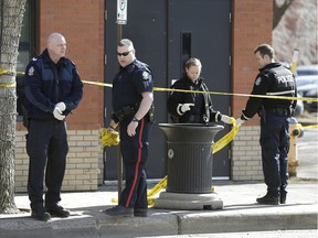 Police investigate a shooting outside the Tribute Lounge near 81 Avenue and 105 Street in Edmonton.