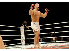 EDMONTON, ALBERTA: MAY 9, 2014 -Victor Valimaki (right/Edmonton, Alberta) celebrates after defeating Bill Widler (left/Redding, California) at the Maximum Fighting Championship 40 mixed martial arts fight card held at the Shaw Conference Centre in Edmonton on Friday May 9, 2014. (PHOTO BY LARRY WONG/EDMONTON JOURNAL)