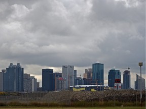 Heavy clouds hang over the city skyline in Edmonton on Wednesday Sept. 16, 2015.