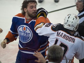 EDMONTON, ALTA: ¬†DECEMBER 31, 2015 -- Patrick Maroon (19) refuses to fight Luke Gazdic (20) as the Edmonton Oilers play the Anaheim Ducks at Rexall place in Edmonton, December 31, 2015.