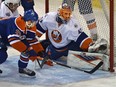 Edmonton Oilers Leon Draisaitl (29) scores what turned out to be the winning goal on New York Islanders Jaroslav Halak (41) during NHL action at Rexall Place in Edmonton on Feb. 28, 2016.