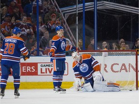 Goalie Laurent Brossoit (1) of the Edmonton Oilers looks defeated after letting in Colorado Avalanche's second goal of the night at Rexall Place  in Edmonton on March 20, 2016.