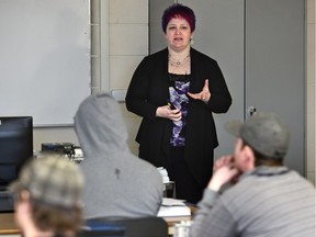 Andrea Taylor facilitates a presentation for a second-year welding apprenticeship class about suicide prevention specifically among men in the trades at NAIT's South Campus in Edmonton, March 22, 2016.