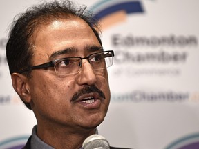 Federal infrastructure Minister Amarjeet Sohi talks to the media Tuesday after addressing the Edmonton Chamber of Commerce.